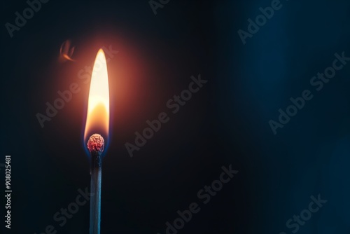 A Glowing Match Igniting Brightly in Dark Surroundings Illuminating the Atmosphere, Copy Space