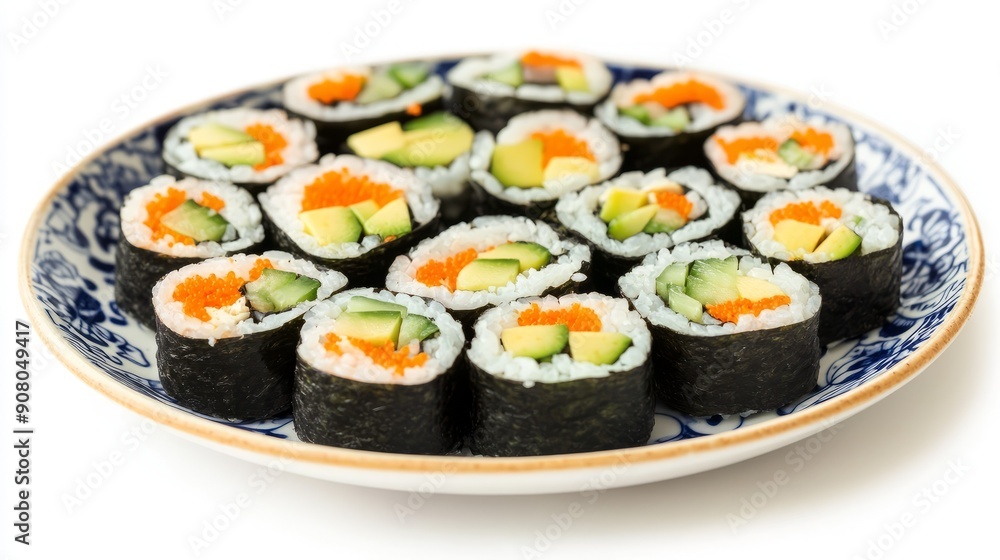 Fresh sushi rolls with avocado and carrot. Close-up of a plate of assorted sushi rolls with avocado, carrot, and cucumber filling. The rolls are arranged in a circle and are ready to be eaten. Fresh sushi rolls with avocado and carrot. Close-up of a plate of assorted sushi rolls with avocado, carrot, and cucumber filling. The rolls are arranged in a circle and are ready to be eaten.