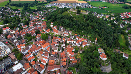 Aerial panorama view around the old town of the city Gudensberg in Germany on a summer day afternoon.	 photo