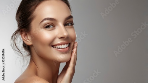 Smiling brunette model with fresh skin and healthy glow, perfect for skincare and beauty concepts