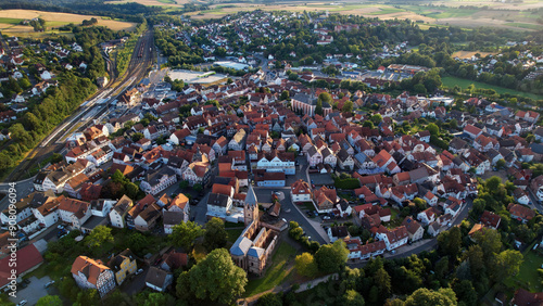 An aerial panorama view around old town of Schwalmstadt on a sunny summer day in Germany.