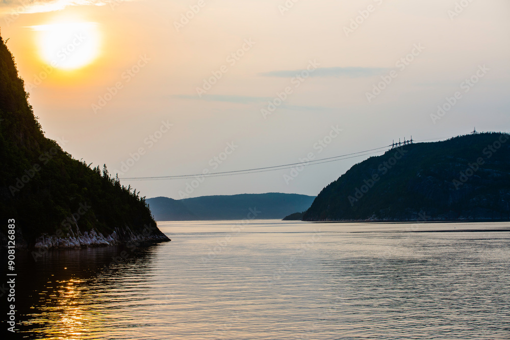 Tadoussac, Canada - July 28 2024: Stunning sunset sight in Saguenay fjord Tadoussac, Canada - July 28 2024: Stunning sunset sight in Saguenay fjord