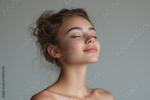 Wallpaper Mural A close up of a girl's face with her eyes closed Torontodigital.ca