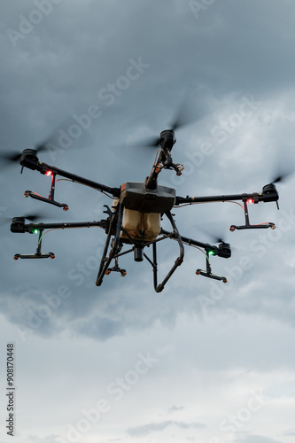 Agrodrone sprayer sprays sunflower fields, precision farming, the latest agriculturethe. Drone - new technology in farming.