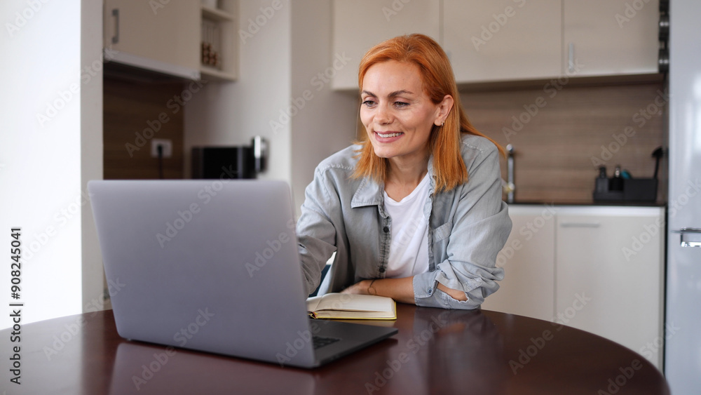 Happy woman planning her work from home Happy woman planning her work from home