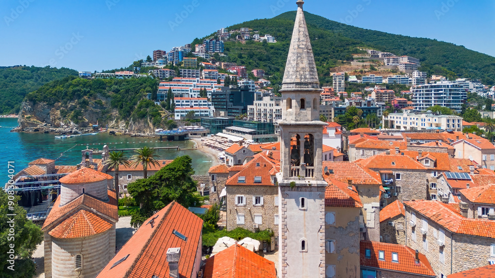 Obraz premium Aerial view of the Holy Trinity Church in the Old Town of Budva, built on a peninsula along the coast of the Adriatic Sea in Montenegro