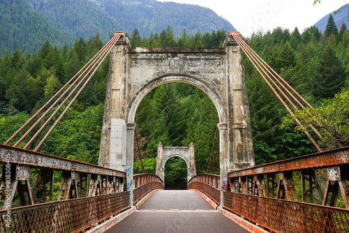 Second Alexandra Bridge, a suspension bridge opened in 1927 spanning the Fraser River within the lower Fraser Canyon of British Columbia, Canada photo