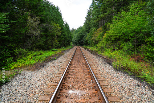 Railway along the Trans-Canada Highway 1 in the Fraser Canyon near the Old Alexandra Bridge in Spuzzum, British Columbia, Canada photo