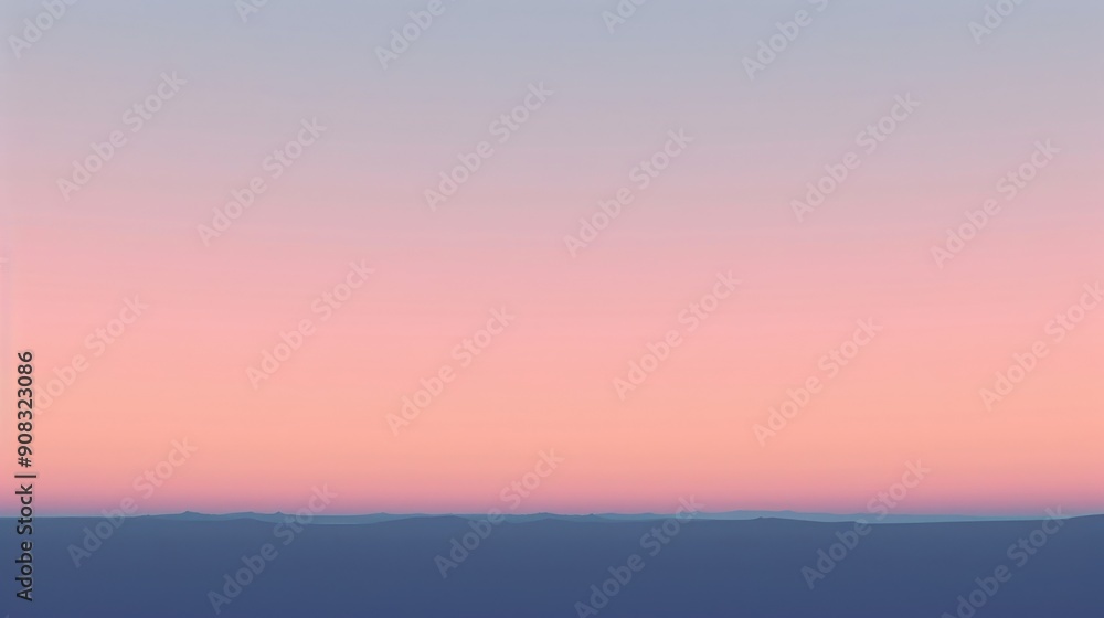 Fototapeta premium A smooth gradient background transitioning from deep navy blue at the top to a soft pastel pink at the bottom, the seamless blend of colors creating a calm and soothing visual effect