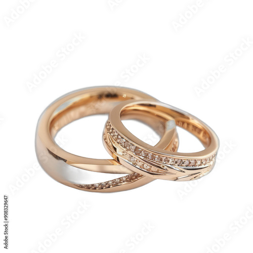 Two gold wedding rings with diamonds and a white band