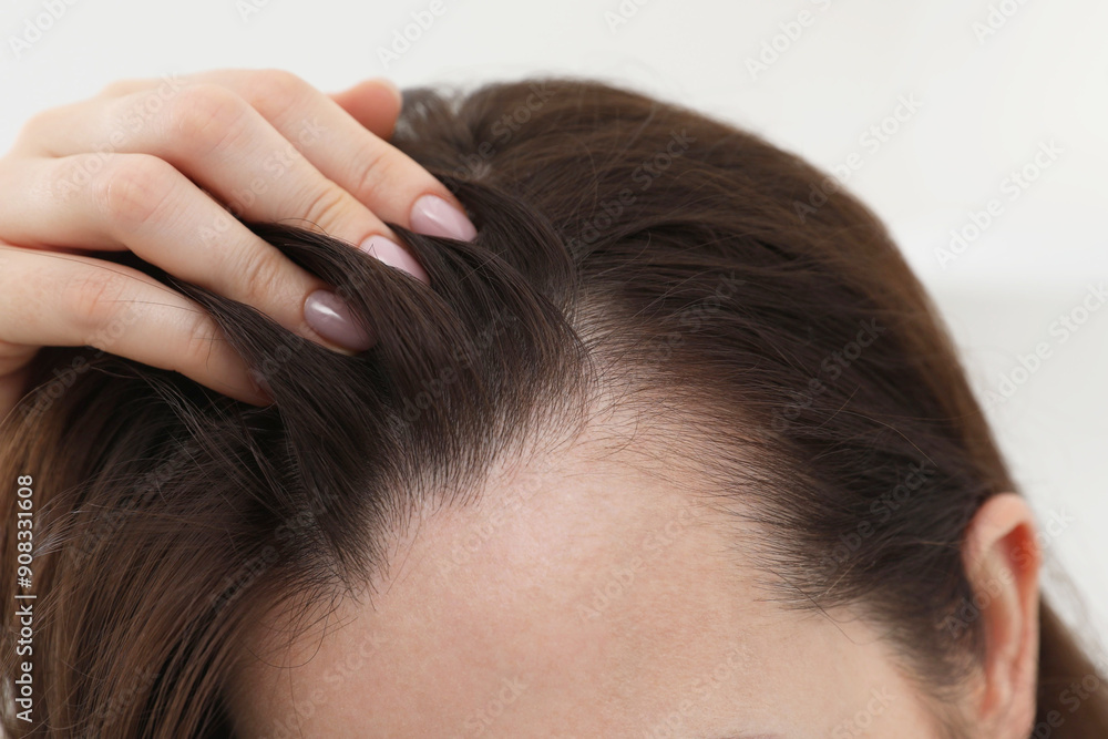 Woman with hair loss problem at home, closeup Woman with hair loss problem at home, closeup