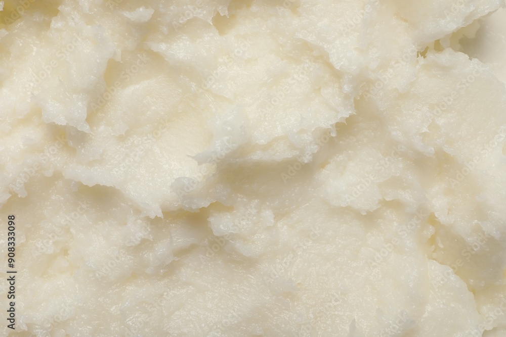 Natural shea butter as background, top view Natural shea butter as background, top view