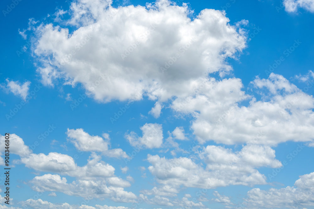 Blue sky background with tiny clouds. The vast blue sky and clouds sky on sunny day. Blue sky background with tiny clouds. The vast blue sky and clouds sky on sunny day.