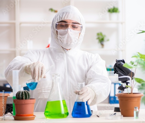 Biotechnology chemist working in lab