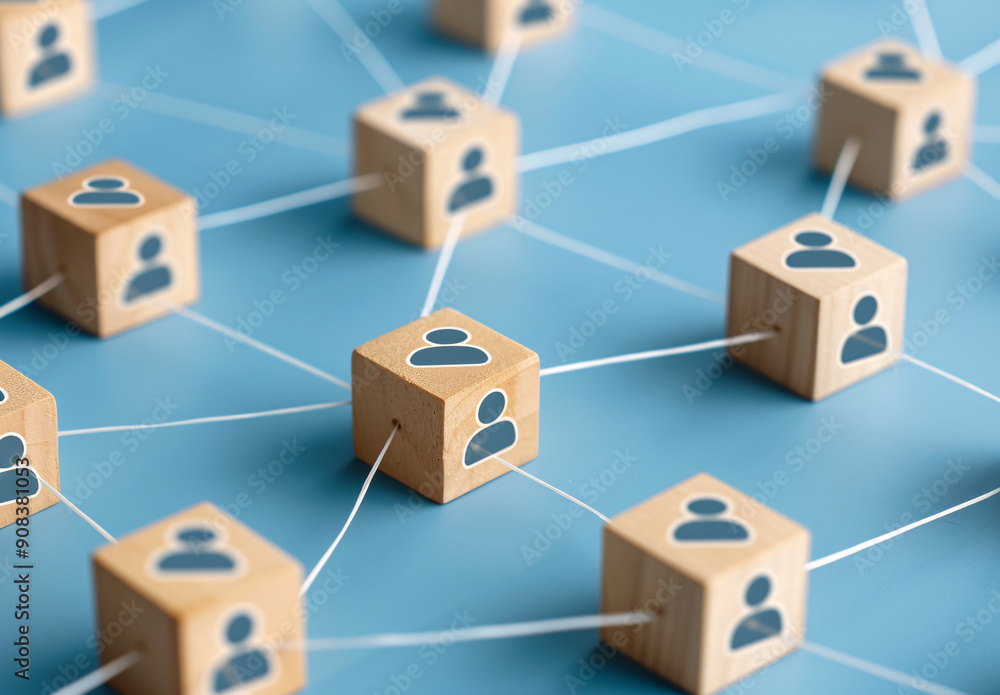 Social network graph on wooden blocks with people icons Social network graph on wooden blocks with people icons