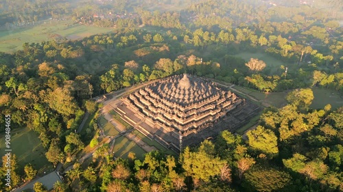 Aerial view of the majestic Borobodur Temple in Yogyakarta at sunrise, Indonesia.