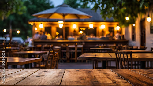 photo wooden table and blurred background of outdoor restaurant with bokeh light. High quality photo 