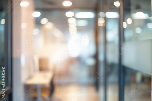 Abstract blurred office interior room with defocused effect. Modern working space with bright light and sleek design. Luxurious urban architecture with glassy window and hallway.