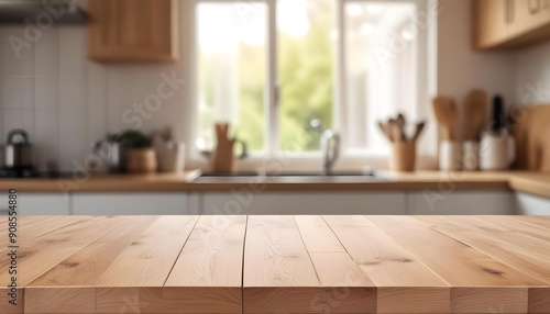 Wooden table top with blurred kitchen interior in the background