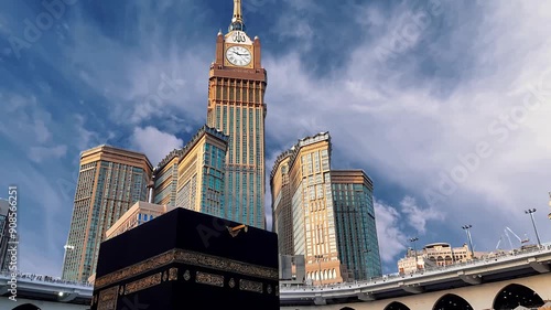 Sacred Silhouette: Haram Mosque, Kaaba. Muslims perform their worship at the Holy Kaaba Stock Video Footage. Islam, Religion of peace. Close 
Mecca Clock tower Timeplase. 
Time lapse of Haram in mecca
