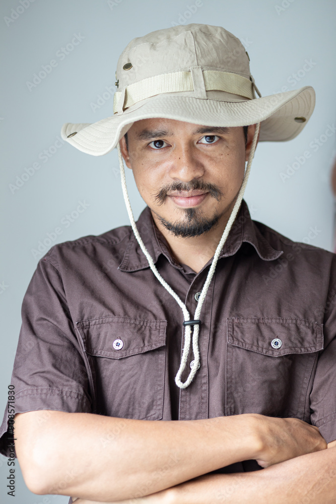 Samart executive camping man with advaenture hat on white background Samart executive camping man with advaenture hat on white background