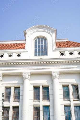 bottom view of classic old building with empty sky space for advertising.