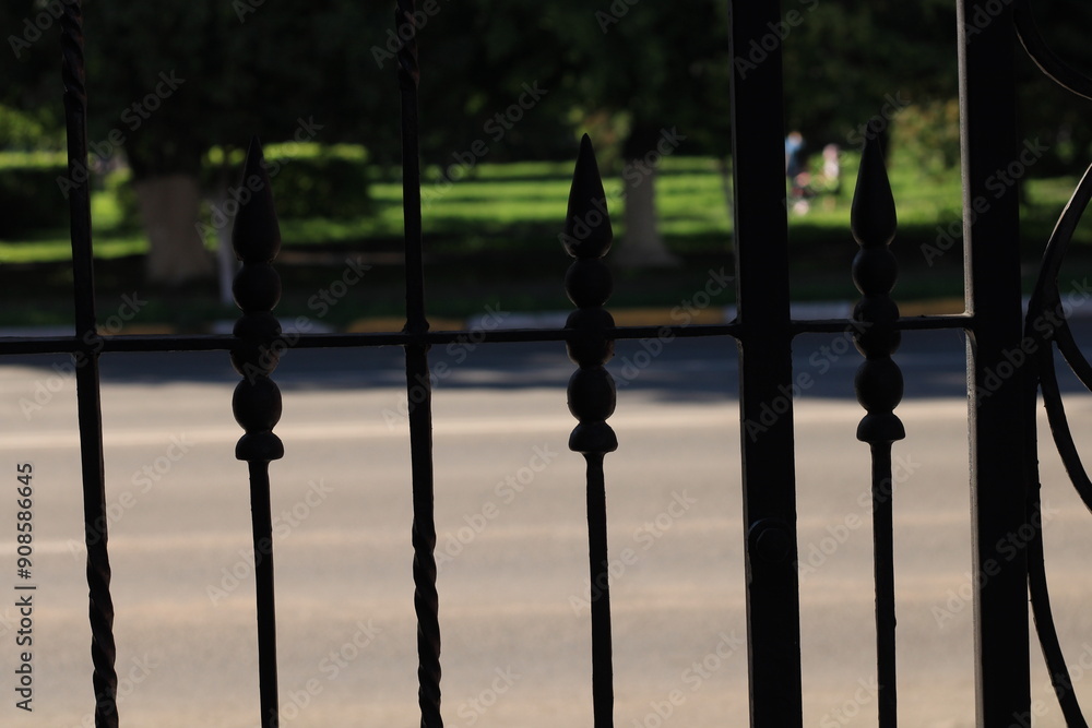 wrought fence at sunset wrought fence at sunset