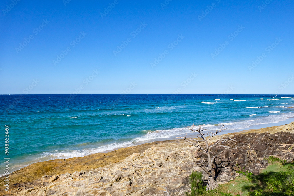 A beautiful sunny blue sky summer day at North Stradbroke island, Cleveland, Brisbane, Queensland, Australia A beautiful sunny blue sky summer day at North Stradbroke island, Cleveland, Brisbane, Queensland, Australia