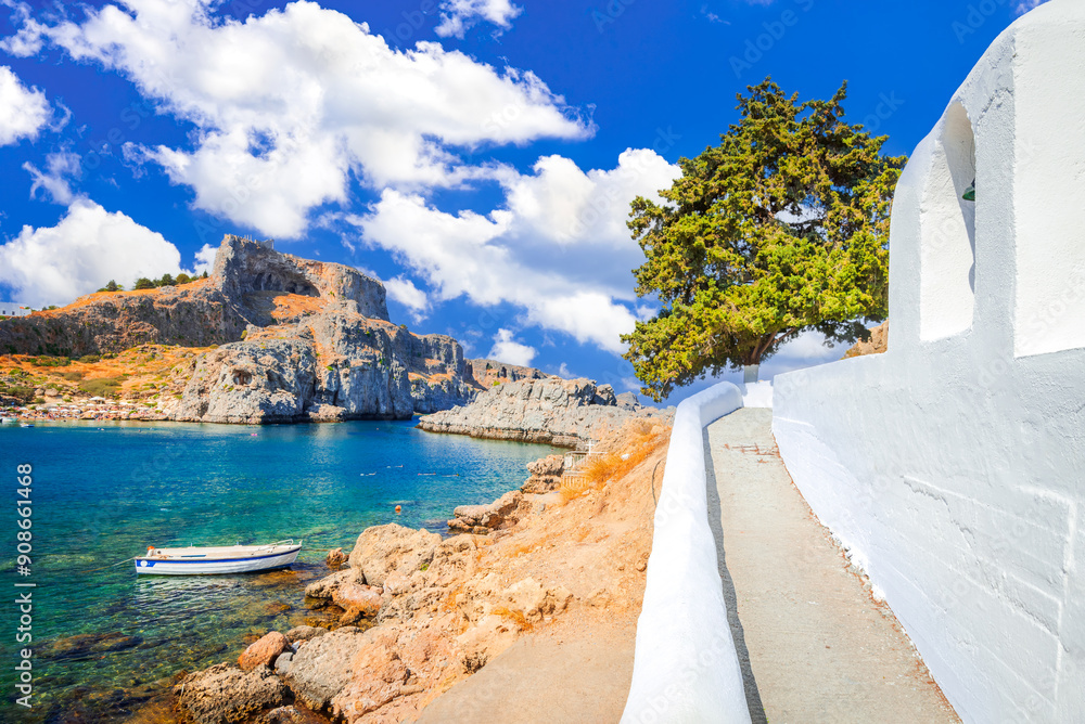Lindos, Rhodes. Ancient acropolis and St Paul bay at Aegean Sea - Greek Islands in Greece.