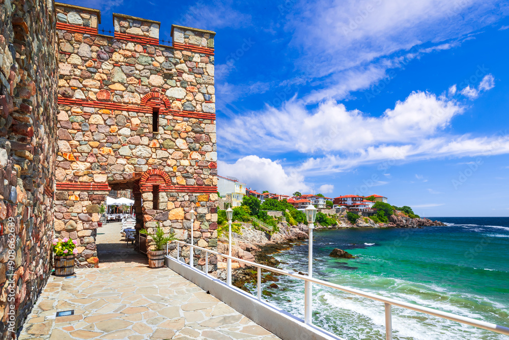 Sozopol, Bulgaria. Summertime travel landscape with ancient walls of Apollonia and Black Sea rocky coastline.