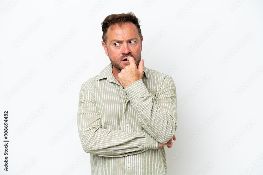 Middle age caucasian man isolated on white background nervous and scared Middle age caucasian man isolated on white background nervous and scared