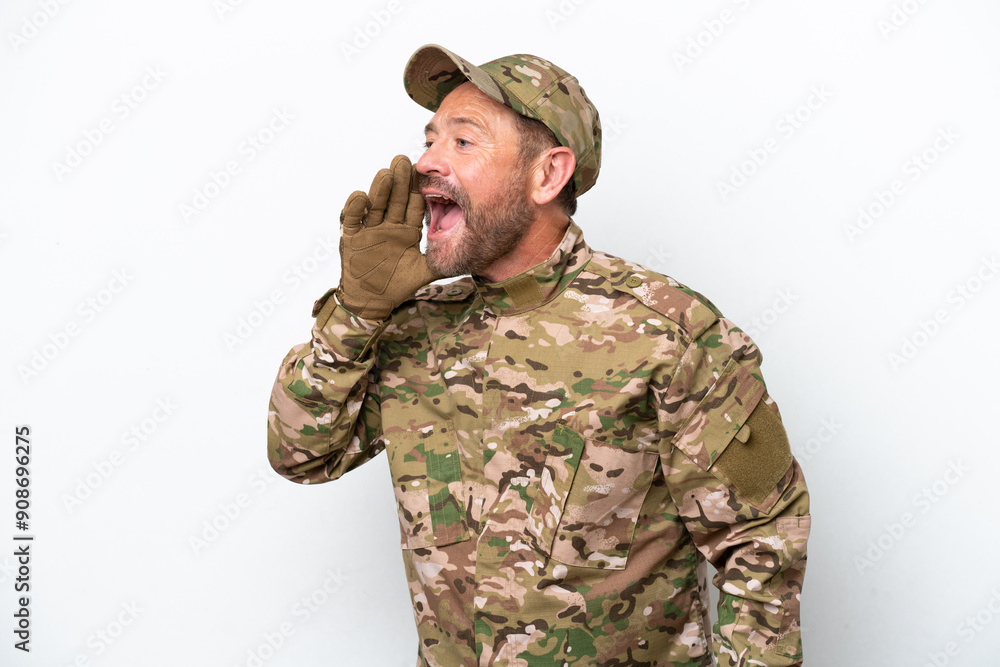 Military man isolated on white background shouting with mouth wide open to the lateral Military man isolated on white background shouting with mouth wide open to the lateral