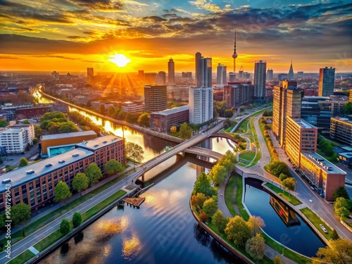 Aerial view of vibrant cityscape at sunrise, with canal, bridges, and modern architecture, conveying a sense of excitement and discovery in urban exploration. photo