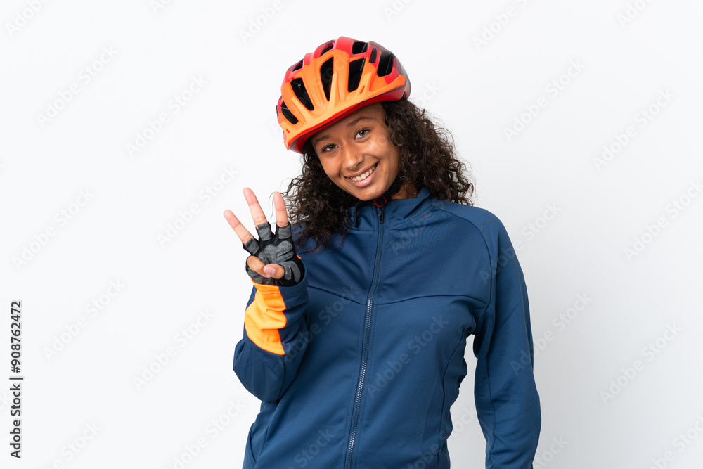 Teenager cyclist woman isolated on white background happy and counting three with fingers Teenager cyclist woman isolated on white background happy and counting three with fingers