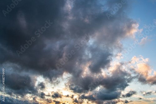 Dramatic Colorful Sunset Sky . Clouds with Sunrays. Cloudscape Nature Background. Panorama