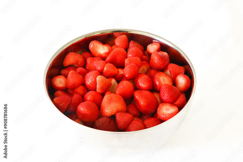Red strawberries in stainless steel bowl on white background Red strawberries in stainless steel bowl on white background