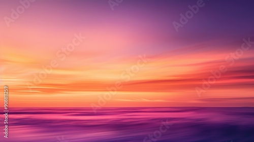 A breathtaking sunrise casts vibrant purple and orange colors across a calm ocean, creating a peaceful atmosphere as day breaks