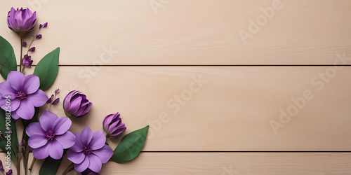 Elegant Floral Ornament with Purple Beautiful Flowers on Wooden Background with Space for Text. photo