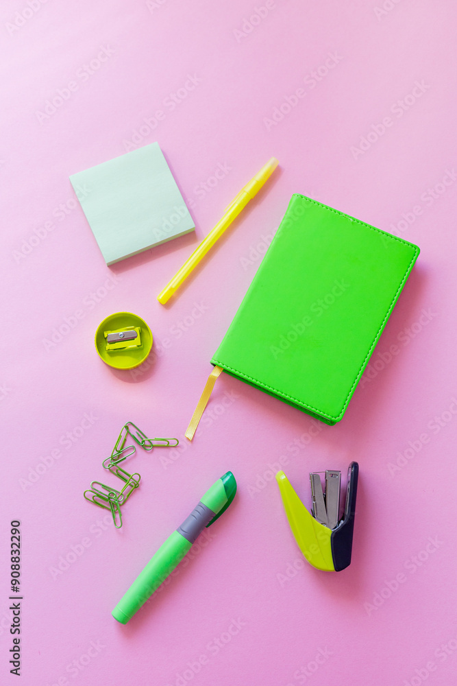 green stationery on a pink background, back to school green stationery on a pink background, back to school