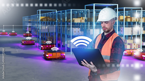 Man controls warehouse robo...