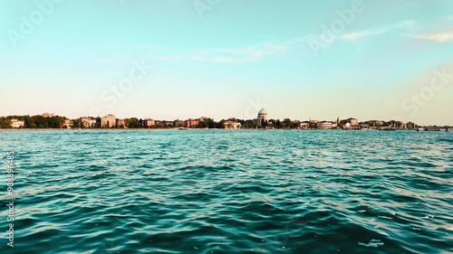 A boat sails along one of Venice's islands, video 4k, 60 fps