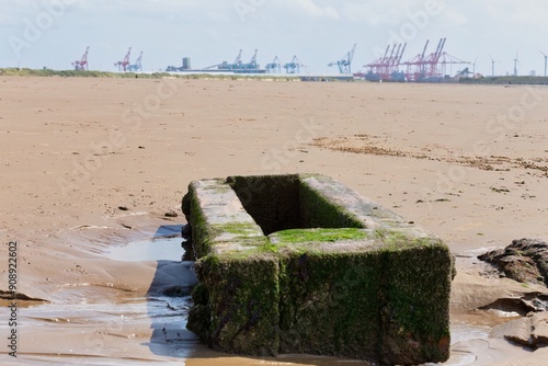 element of pir and port view on beach in in Crosby, UK photo