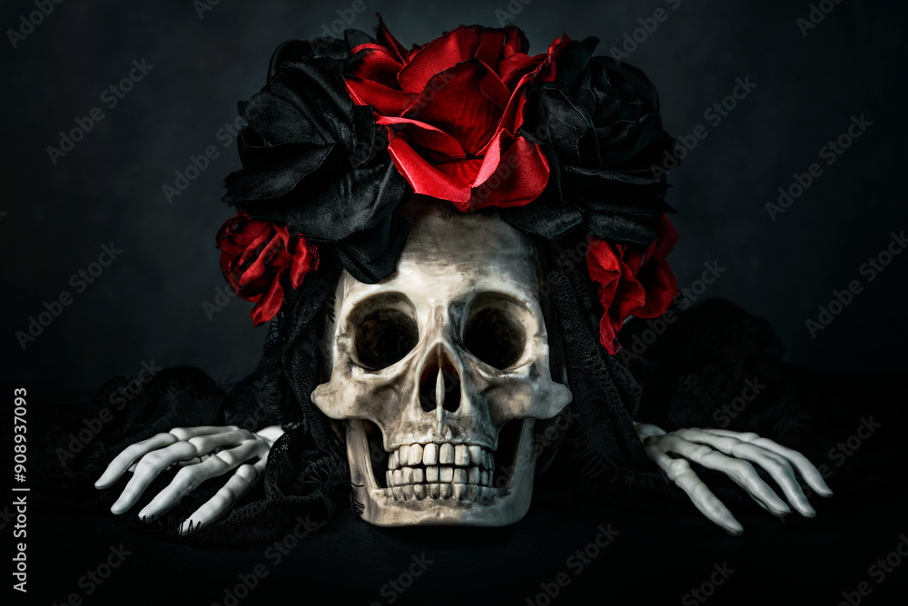 Closeup of Catrina skull and skeleton hand bones. Day of the dead and Halloween concept background Closeup of Catrina skull and skeleton hand bones. Day of the dead and Halloween concept background