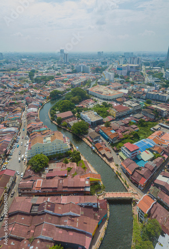 Aerial drone view of historical Malacca City with a river at Melaka, Malaysia.