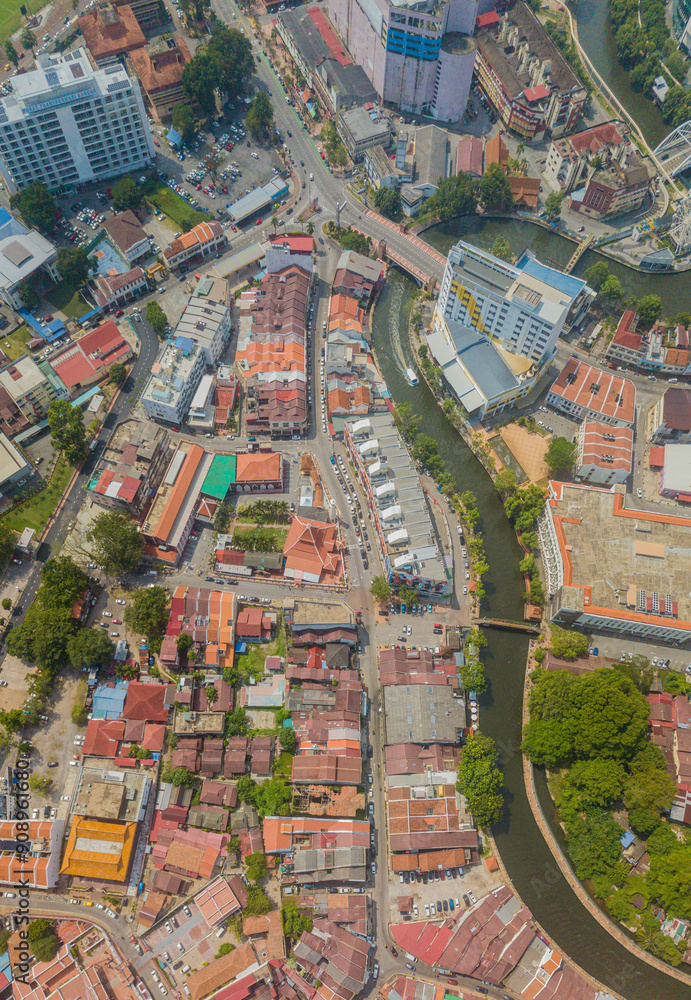 Aerial drone view of big and dense Malacca City with Malaysian settlements at Melaka, Malaysia. Aerial drone view of big and dense Malacca City with Malaysian settlements at Melaka, Malaysia.