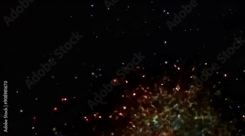 Scattered Glitter in Various Colors on Black Background