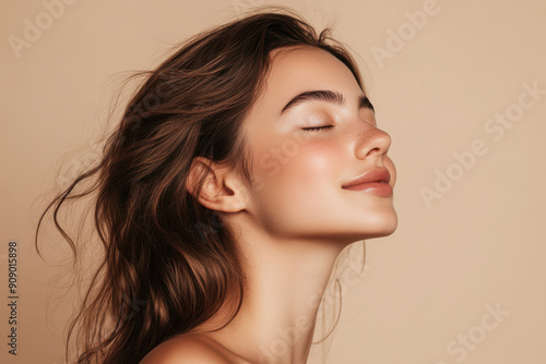 A close up of a girl's face with her eyes closed