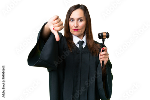 Judge caucasian woman  over isolated background showing thumb down with negative expression photo