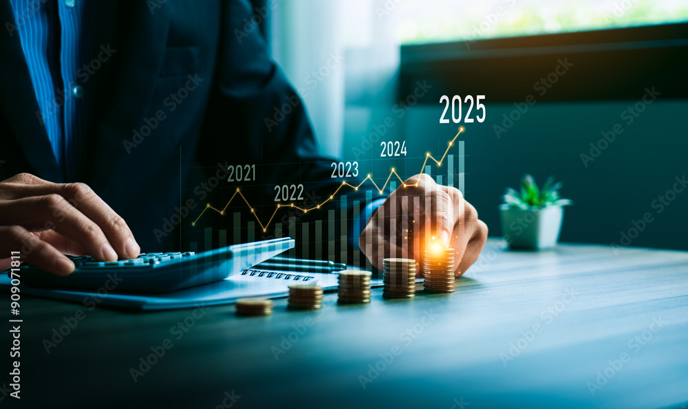 Businessman Calculating Financial Growth from 2025 with Stacked Coins and Graph, Representing Strategic Investment Planning and Future Economic Success, analytical businessperson planning business Businessman Calculating Financial Growth from 2025 with Stacked Coins and Graph, Representing Strategic Investment Planning and Future Economic Success, analytical businessperson planning business
