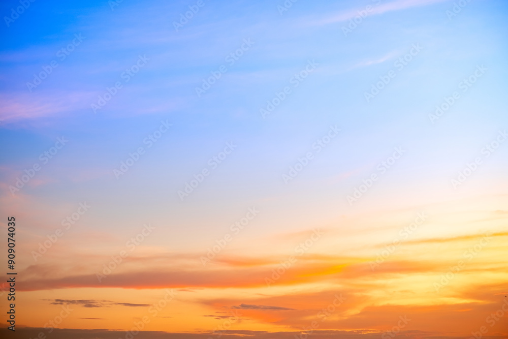 Beautiful , luxury soft gradient orange gold clouds and sunlight on the blue sky perfect for the background, take in everning,Twilight, Large size, high definition landscape photo Beautiful , luxury soft gradient orange gold clouds and sunlight on the blue sky perfect for the background, take in everning,Twilight, Large size, high definition landscape photo